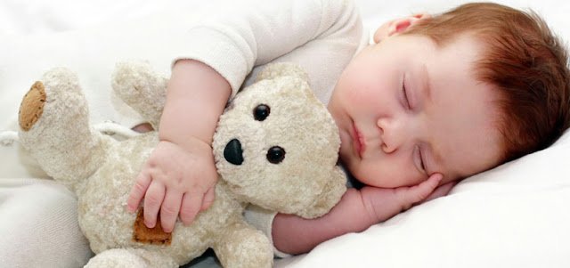 cute_baby_hugging_and_sleeping_with_teddy_bear_doll_photo_HD_image